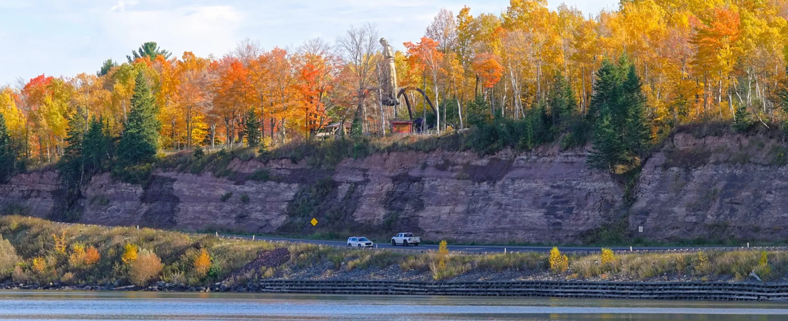 View of Shrine on cliff from lake View of Shrine on cliff from lake